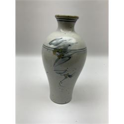 Studio pottery vase of baluster form with a light mottled blue ground with abstract painted decoration, H26cm