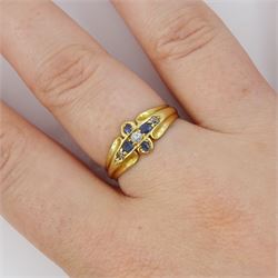 Victorian 18ct gold sapphire and diamond ring, three old cut and single cut diamonds, the principal diamond with four oval cut sapphire surround, to a ridged design shank, Birmingham 1899