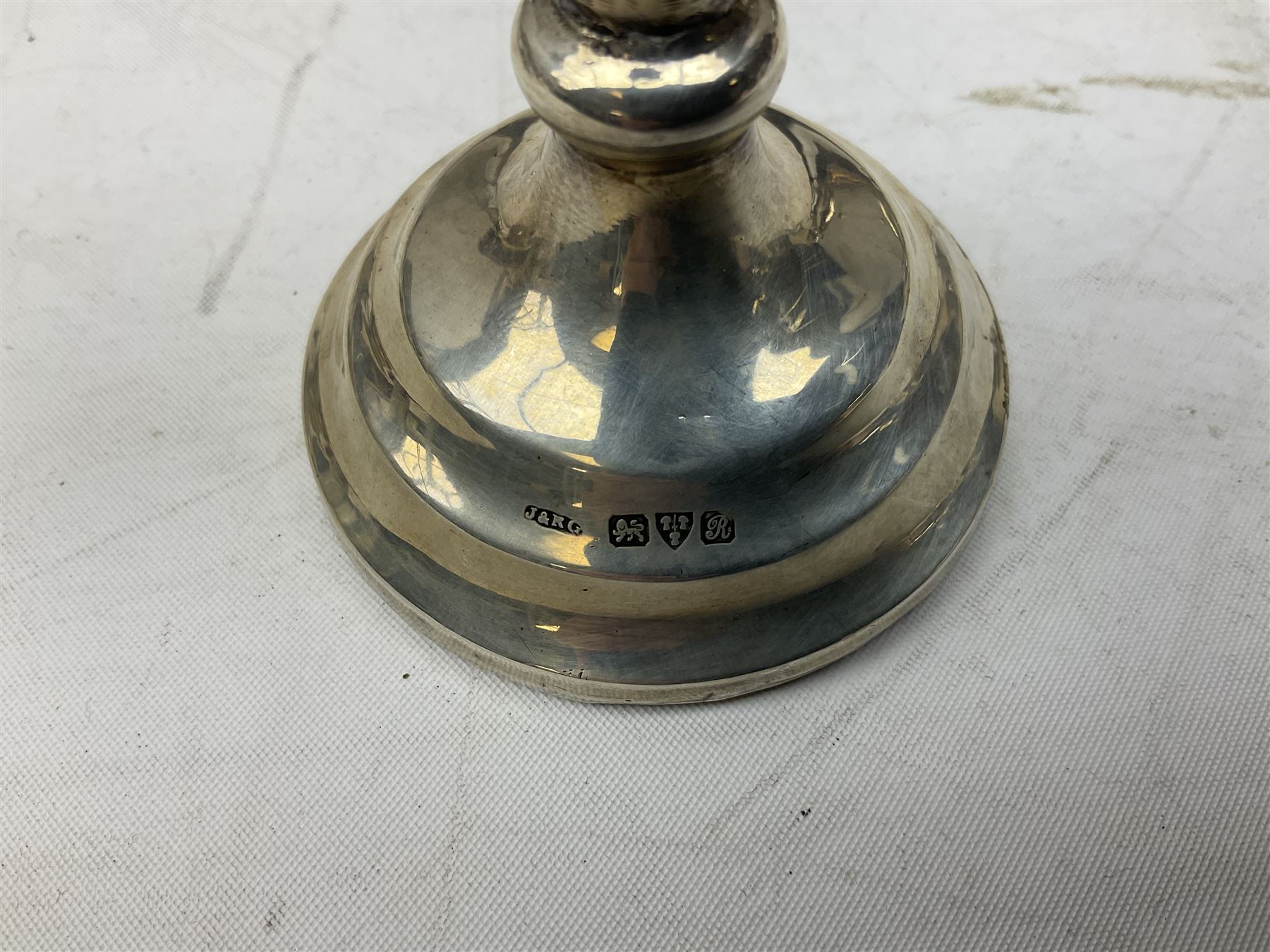 Early 20th century hallmarked silver trumpet vase stamped J & R Griffin (Joseph & Richard Griffin), Chester 1917, with weighted base, together with a 19th century silver-plate biscuit barrel by JK&Co, ornately engraved throughout, John Round & Son silver plated twin handled cup, and other silver plated and other metal ware to include ornate teapots, tray etc