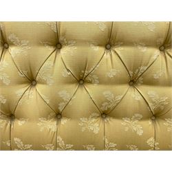 Traditional shaped two seat sofa, upholstered in pale ochre buttoned fabric, feather cushions