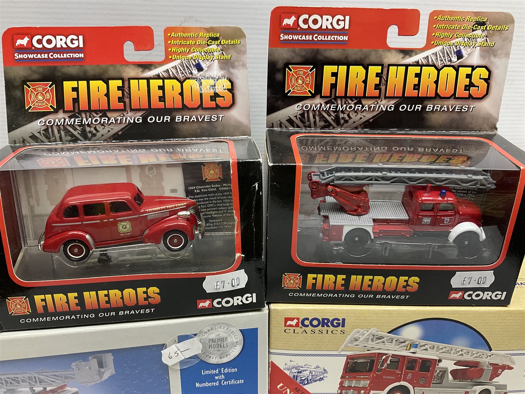 Corgi - eleven fire-fighting vehicles comprising limited edition 54706 E1 Side Mount Washington DC and 54902 E1 75ft Ladder Duncan Fire Department; 97392 Simon/Dennis Hydraulic Platform; 97361 AEC Turntable Ladder;  and seven 'Fire Heroes'; all boxed (11)