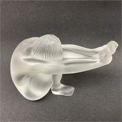 Lalique Nude Temptation, a frosted glass figure of a woman crouching with leg outstretched, in original box, H8cm