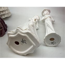 A group of figurines, comprising two boxed Spode Pauline Shine examples, Lily and Olivia (one a/f), a Royal Douton figurine First Dance modelled by F G Doughty, a further Royal Doulton figurine, Debutante, a Royal Doulton figurine, Southern Belle HN2425, and an unmarked continental figurine. 