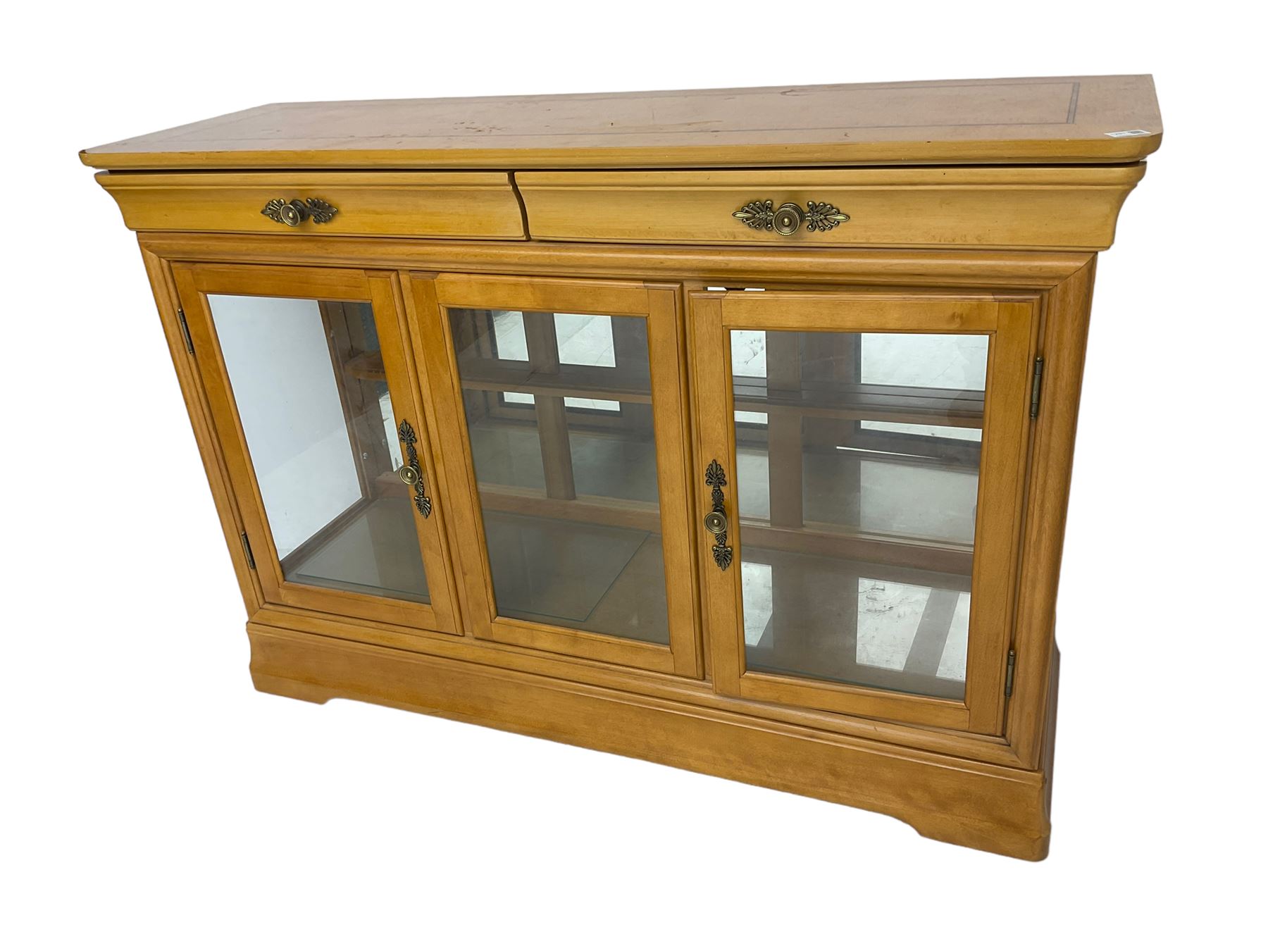 Yew wood sideboard, rectangular top with mahogany and ebony stringing, fitted with two drawers over three glazed cupboard doors enclosing glass shelves