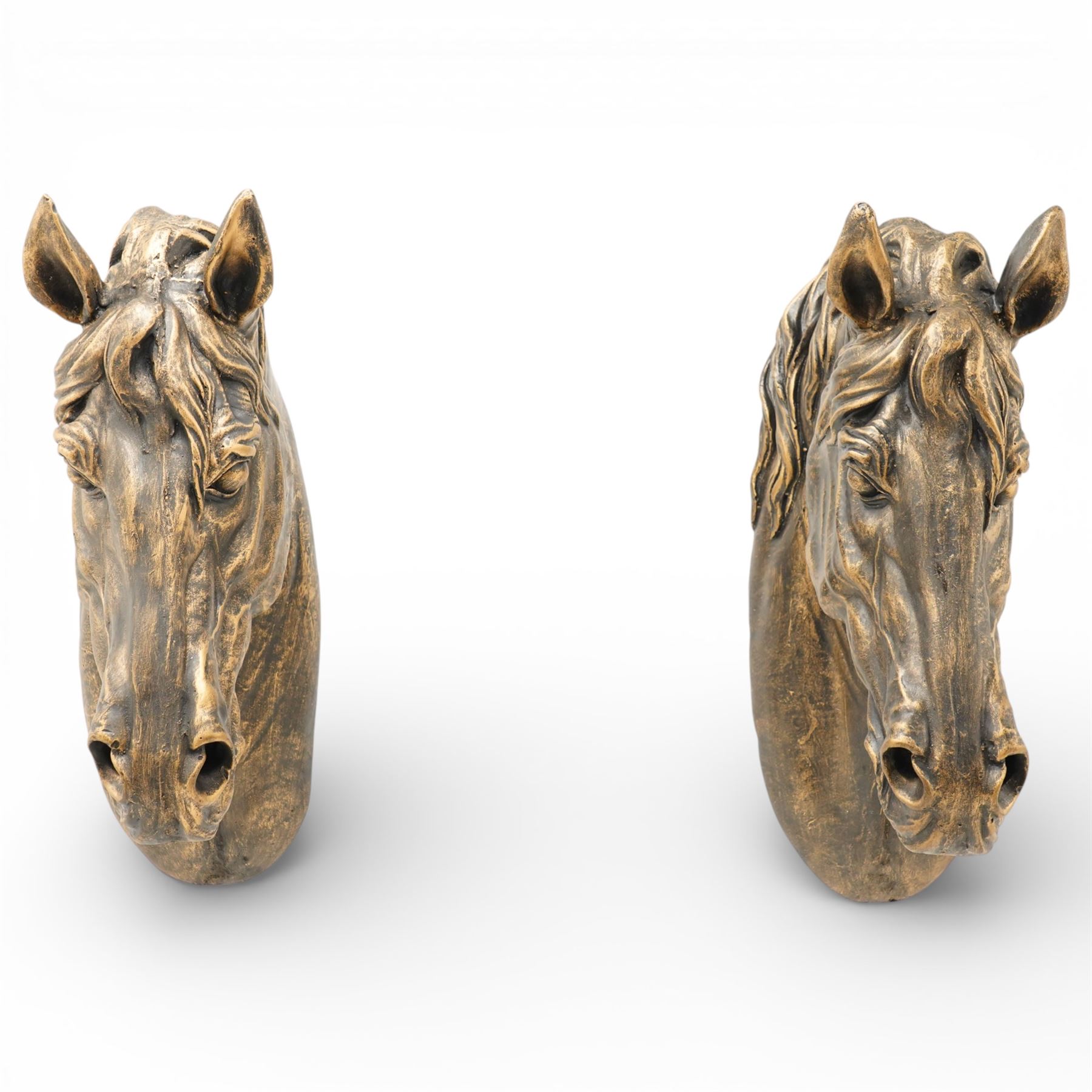Pair of bronzed painted metal horse head wall mounts, 51cm 