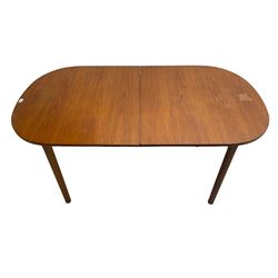 AH McIntosh & Co of Kirkaldy - mid-20th century teak extending dining table, rectangular top with rounded corners, concealed integrated double leaf, raised on tapered supports, 'Furniture by McIntosh sticker to underside of leaf