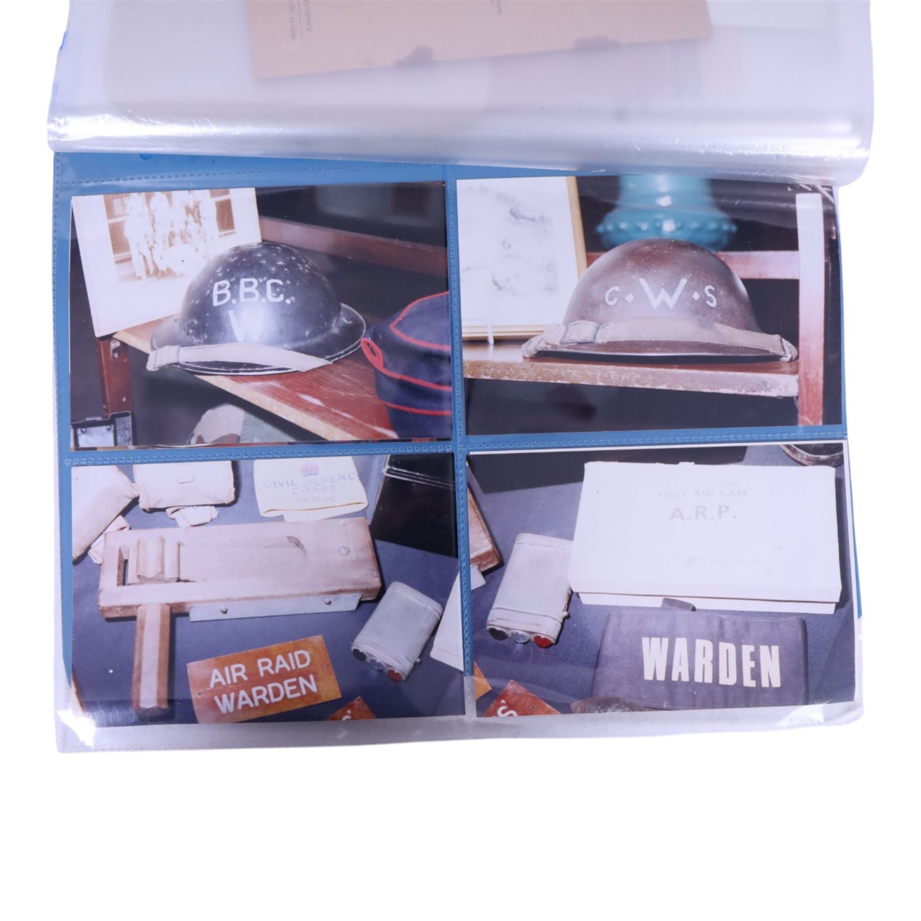 Air Raid Precautions items, including four door plates, silver lapel bedges, Women's Voluntary Service, whistle, matchbox etc  