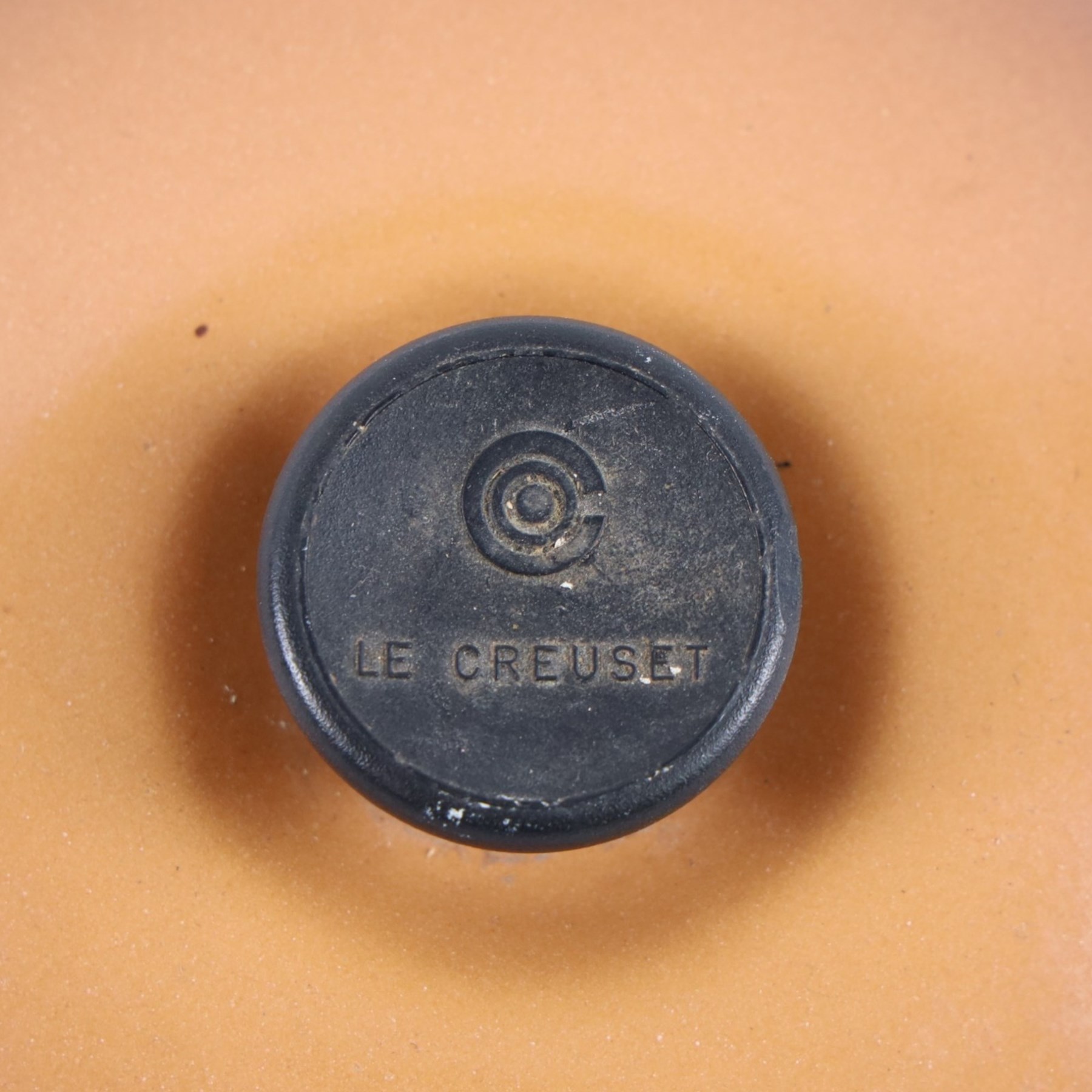 Set of three Le Creuset pans and lid