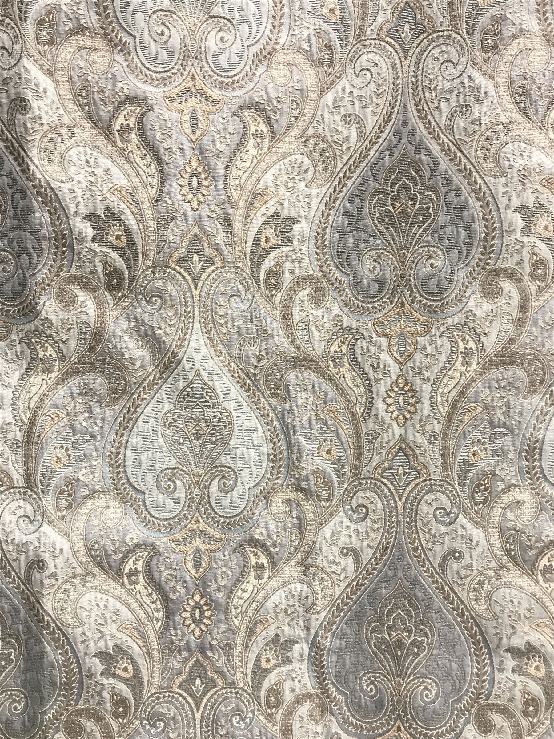 *Pair lined curtains in light blue paisley patterned fabric, W220cm