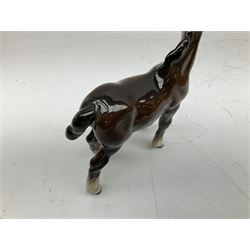 Seven Beswick figures of horses, including Connemara pony in grey no.1641, Arab in bay no.1265, large foal in grey no.947 etc, together with a Goebel figure of a horse (8)
