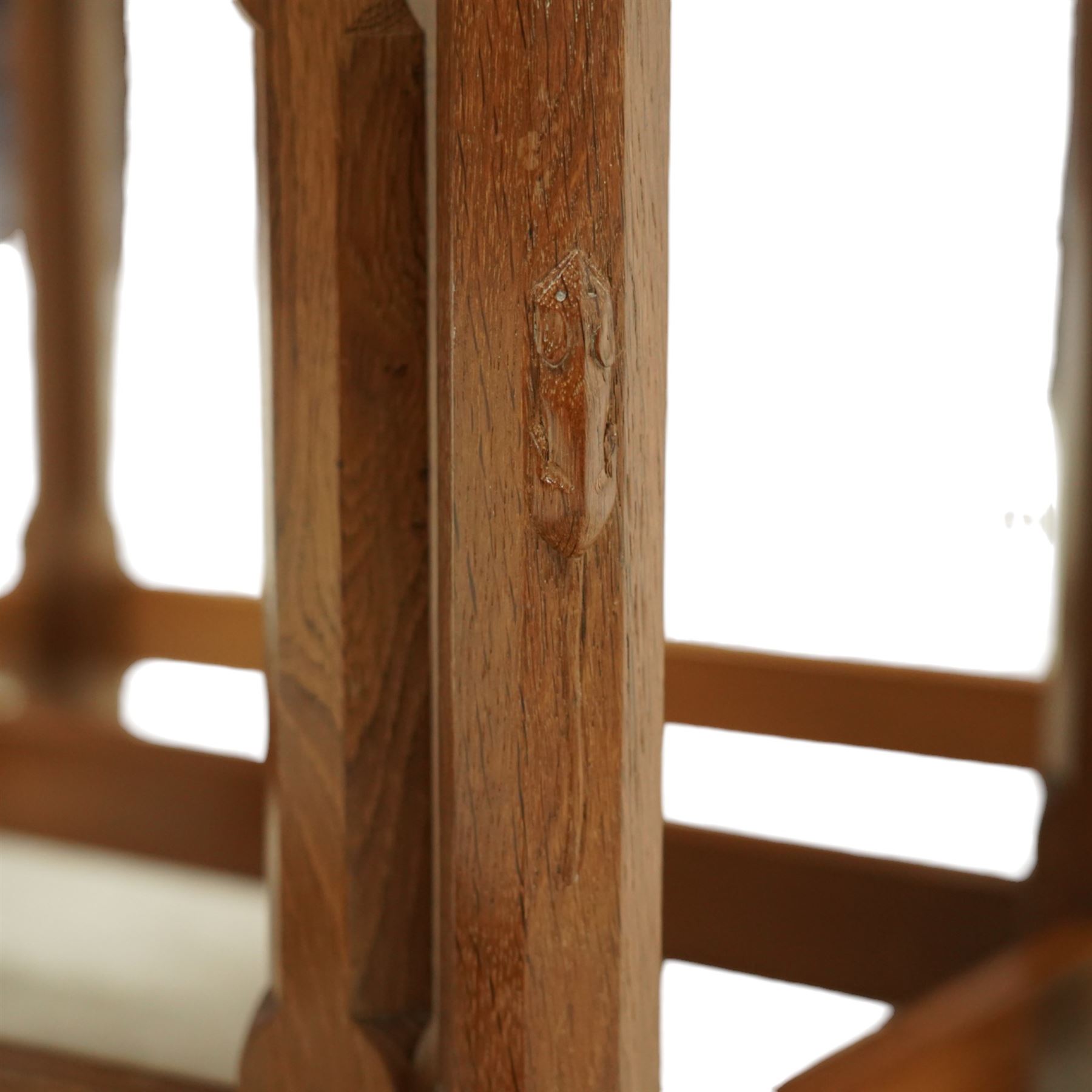 Mouseman - nest of three oak occasional tables, rectangular adzed top, on octagonal supports united by plain stretchers, each carved with mouse signature, by the workshop of Robert Thompson, Kilburn