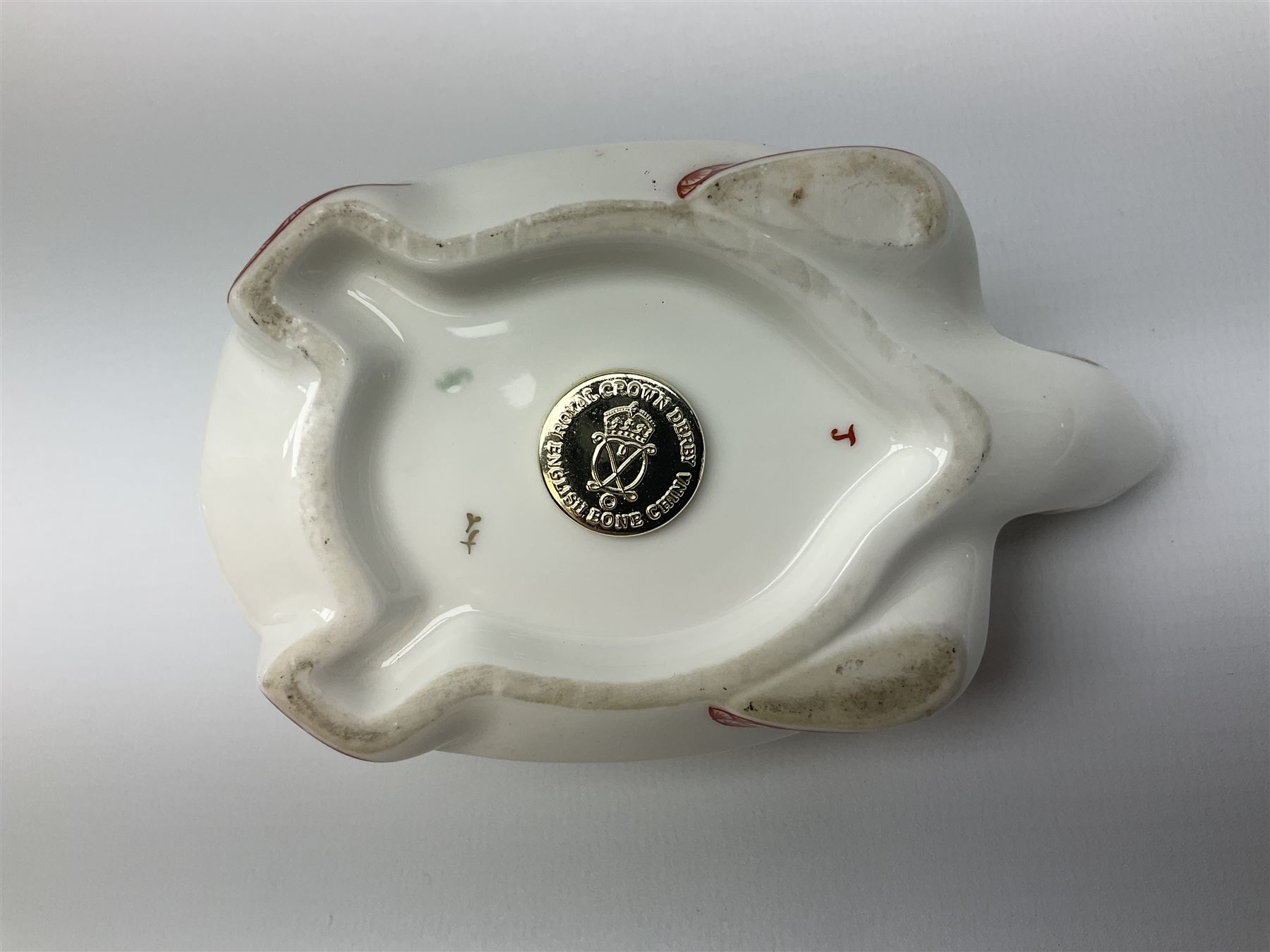 Royal Crown Derby tropical fish paperweight in the form of a Guppy, with a silver stopper, and Royal Crown Derby tortoise paperweight with gold stopper