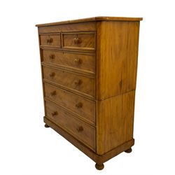 Victorian satinwood chest, fitted with two short and four long drawers, rounded corners, bun feet
