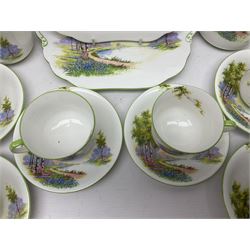 Aynsley Bluebell Time 'As Supplied to the Queen' tea service, comprising hot water jug, six teacups and saucers, milk jug, two cake plates and tow trinket dishes  