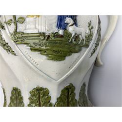 Early 19th century Prattware jug, circa 1800, decorated with two heart shaped panels of children, titled Sportive Innocence and Mischievous Sport, further decorated with acanthus and foliate borders, H22cm