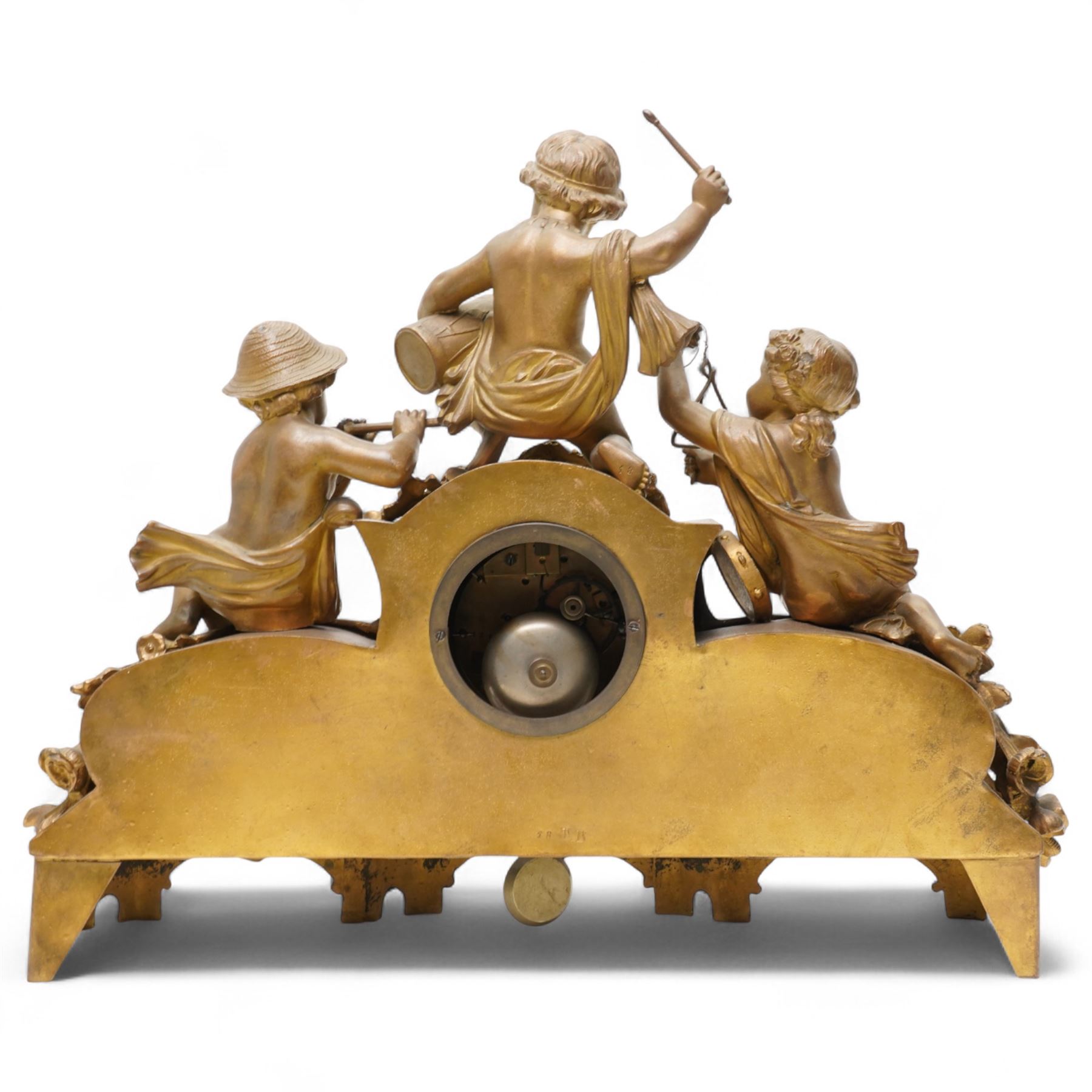 French-late 19th century gilt and spelter mantle clock, highly decorative case with two Sevres style porcelain panels to the front and surmounted with three figures of children playing musical instruments, white enamel dial with Roman numerals and steel moon hands, two train countwheel strike movement, striking the hours and half hours on a bell. With key and pendulum.    