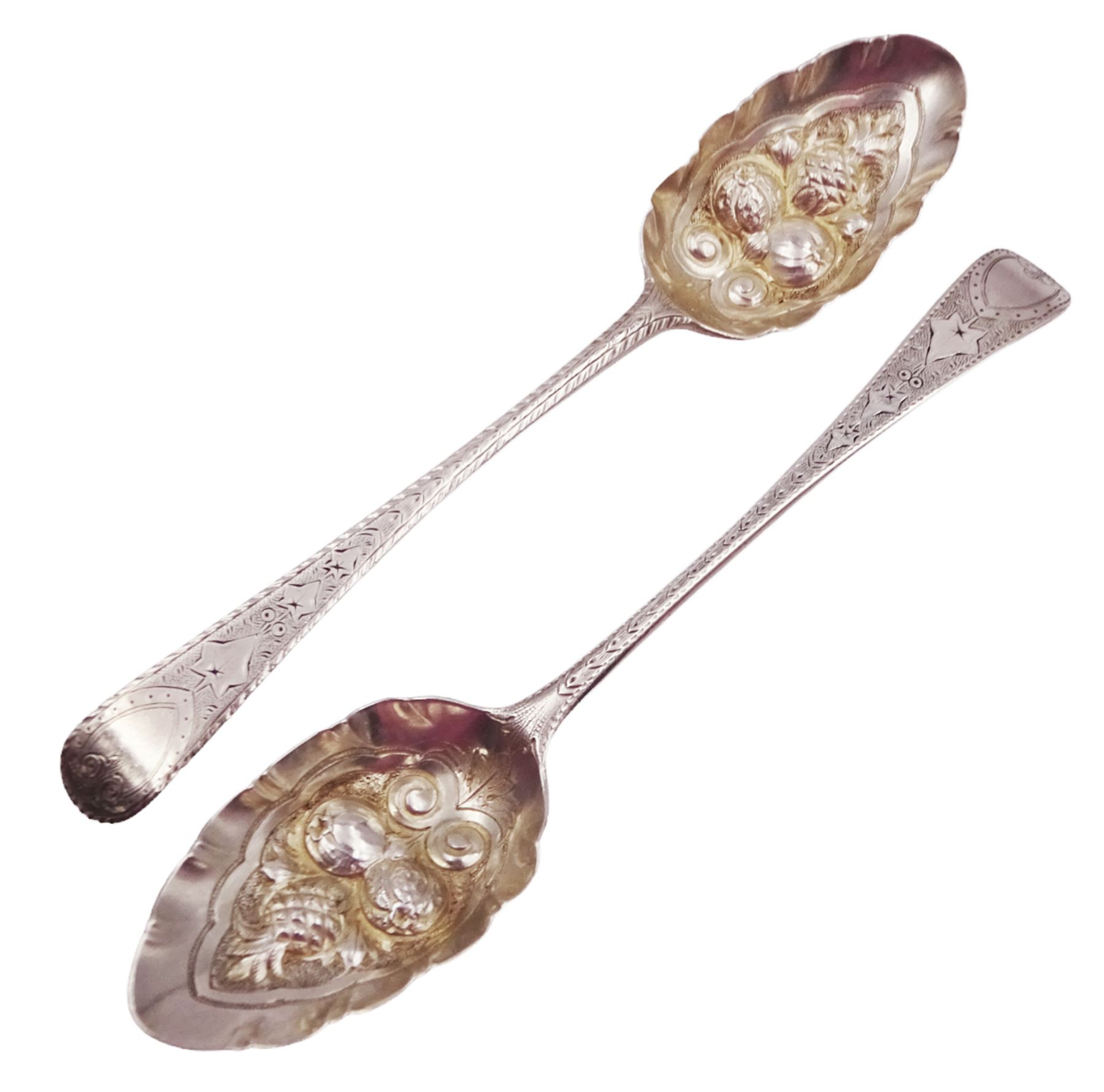 George IV silver fruit serving spoon, the bowl embossed with fruits, with engraved vine leaf decoration to handle, hallmarked London 1789, together with a very similar earlier example, hallmarks worn and indistinct