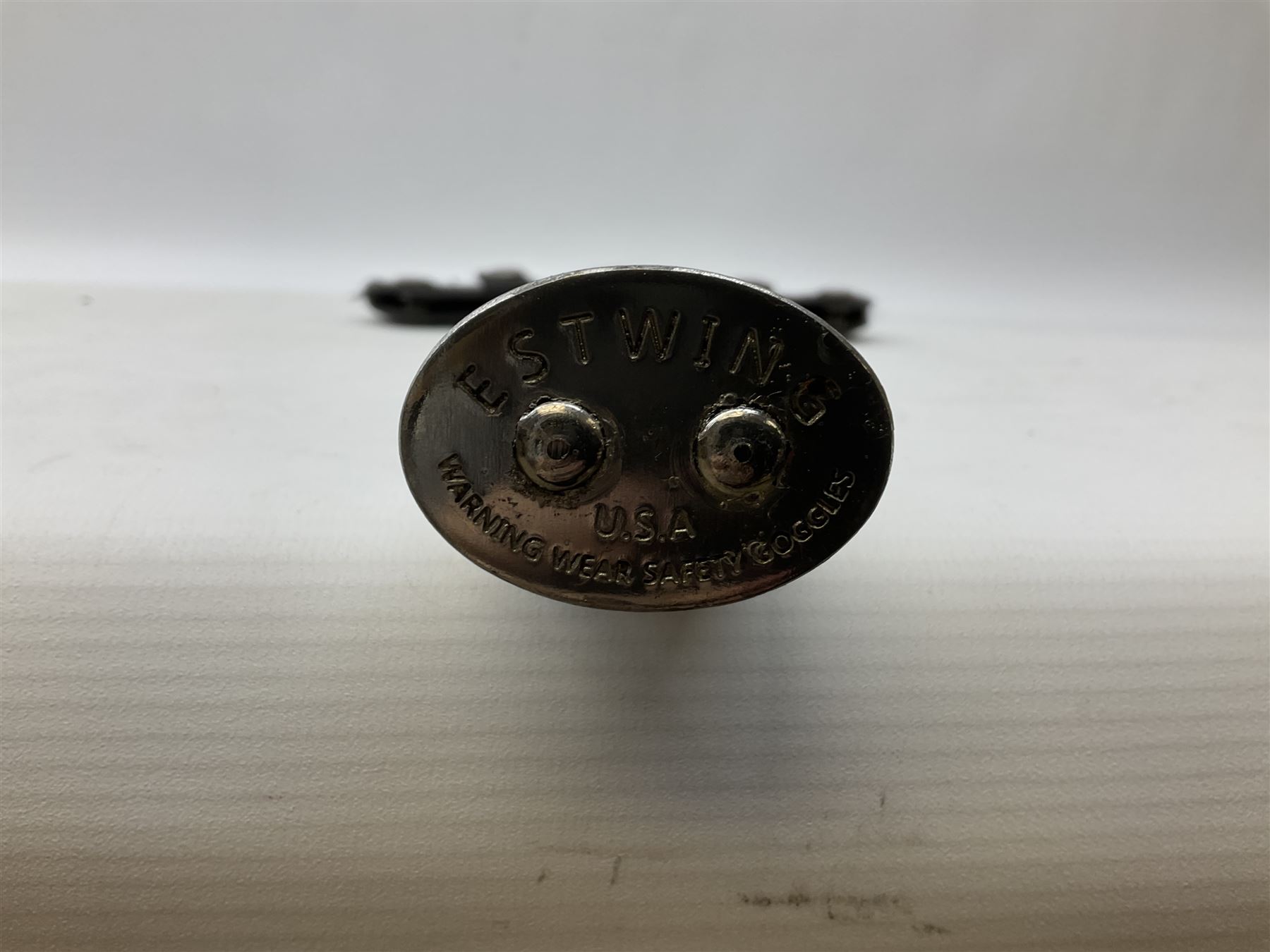 Estwing Black Eagle style double bit throwing axe with leather grip, virtually mint with labels present, plastic blade protectors and nylon sheath L43cm; another smaller Estwing axe stamped 24A to the pommel, with leather grip and sheath; and a vintage short handled hedge knife, the blade stamped IH (?) No.2 (3)