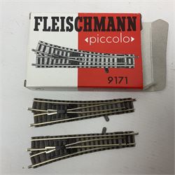Fleischmann 'N' gauge - four-car set with double pantograph locomotive, dummy and two double decker coaches; No.825201 'Piccolo' three-piece wagon set; No.9198 'Piccolo' level crossing; No.9171 'Piccolo' points; and  No.KN35 Girder Bridge; all boxed