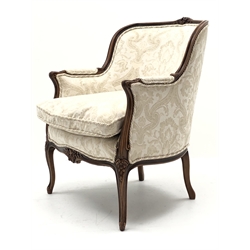  French walnut framed upholstered armchair, moulded frame with floral carved cresting and reeded scroll arms, loose seat cushion and serpentine frieze on cabriole legs, H93cm, W71cm, D68cm (MAO1203)  