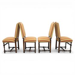 Royal Oak Furniture Co - Jacobean style oak dining table with suite of ten oak high back dining chairs (8+2), rectangular plank top dining table with moulded edge above carved frieze, raised on bulbous turned supports united by stretchers, together with a set of oak framed high back dining chairs including two carvers, upholstered in striped fabric with studded borders, on turned supports united by stretchers 