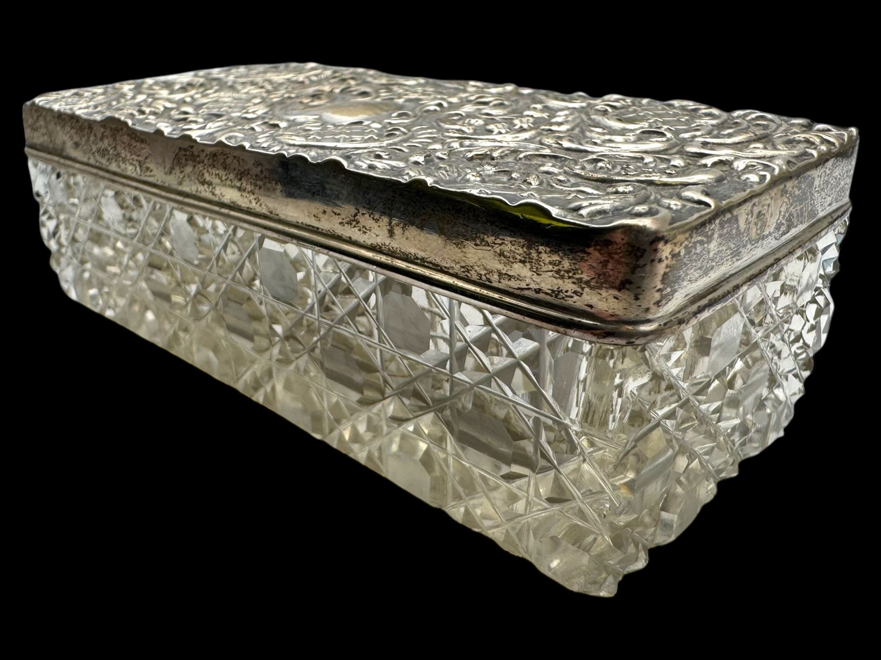 Group of silver, including glass jar with silver lid, pierced pin tray, vase sleeve and two silver lids, all hallmarked 