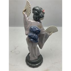 Lladro figure, Madame Butterfly, modelled as a woman holding fans, no 4991, together with two Lladro candle holders, Sailing the Seas no 17665, Lladro 1994 easter egg no 17532, and a Lladro plaque, largest example H30