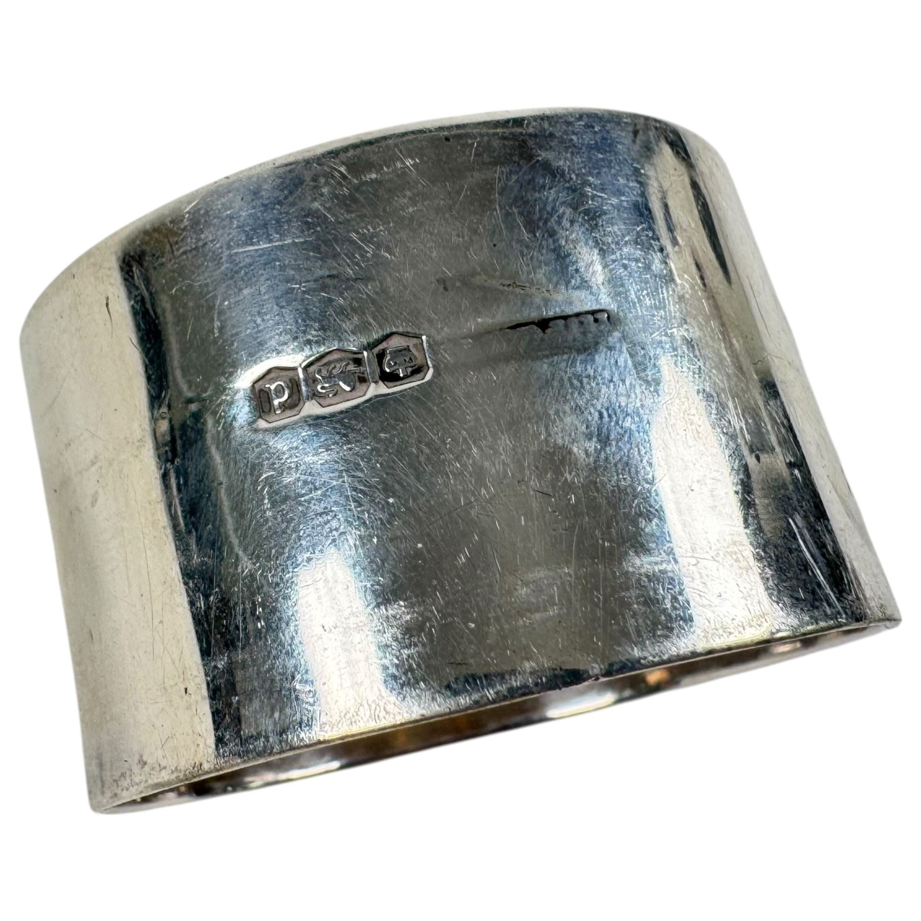 Silver christening mug and napkin ring, both hallmarked 
