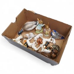 Royal Copenhagen duck No.1934, another of a puppy No.1311, another of two birds No.6811, two Beswick Beatrix Potter figures and other animal ornaments