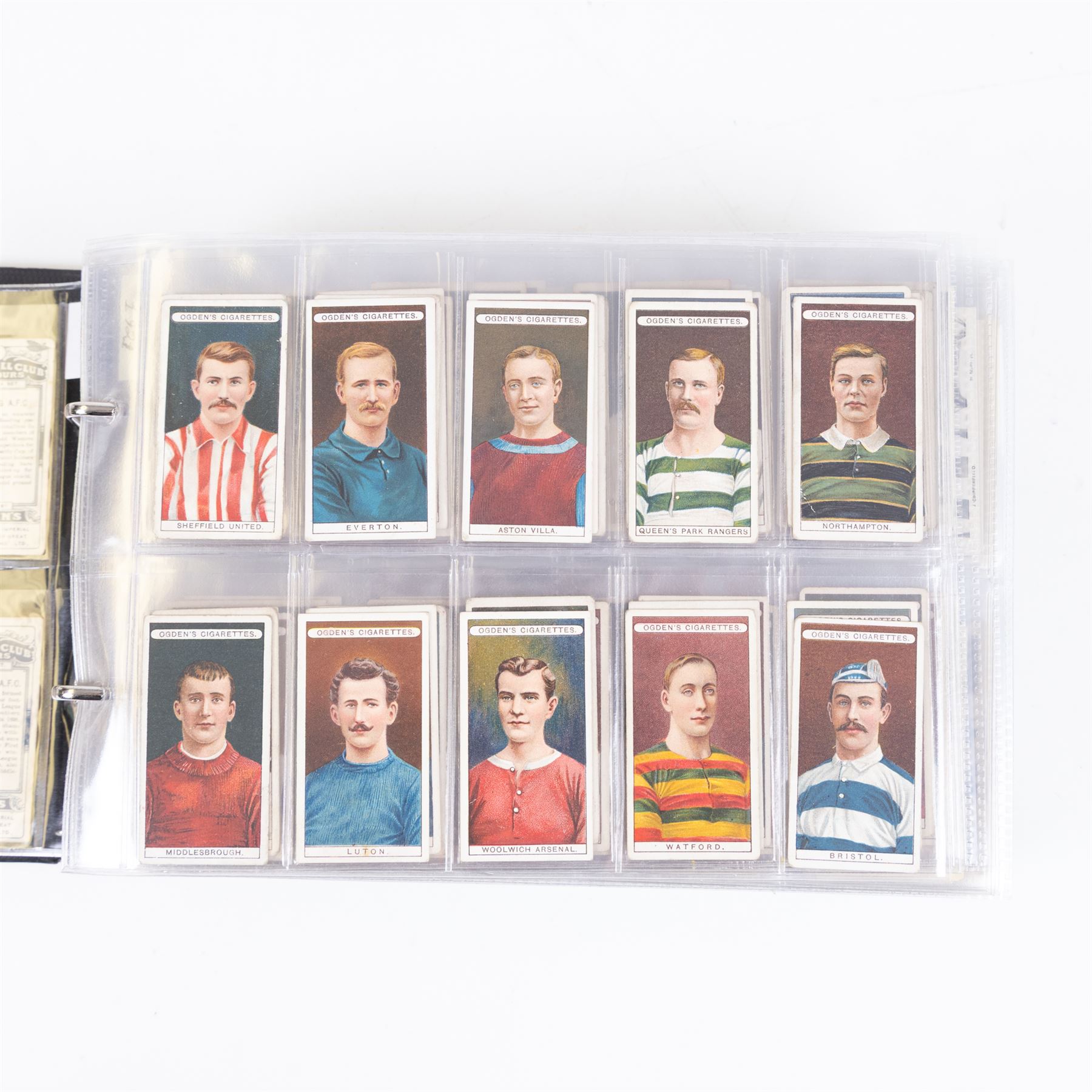 Collection of Edwardian and later Football related trading and cigarette cards, including forty-nine of fifty 1906 Ogden's Football Club Colours, 1922 PALS Footall series, ninety of one hundred 1925 Gallaher Famous Footballers, complete set of forty-four 1926 Ogden's Captains of Association Football Clubs and Colours, complete set of fifty 1927 Players Football Caricatures by MAC,  complete set of fifty 1927 Players Football Caricatures by RIP,  complete set of fifty 1930 Players Association Cup Winners, complete set of 50 1933 Ogdens AFC Nicknames etc, housed in brown cigarette card album
