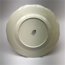 A Royal Worcester fruit painted cabinet plate, hand painted with apples and grapes against a mossy ground, signed S Weston, black printed mark beneath, D27cm