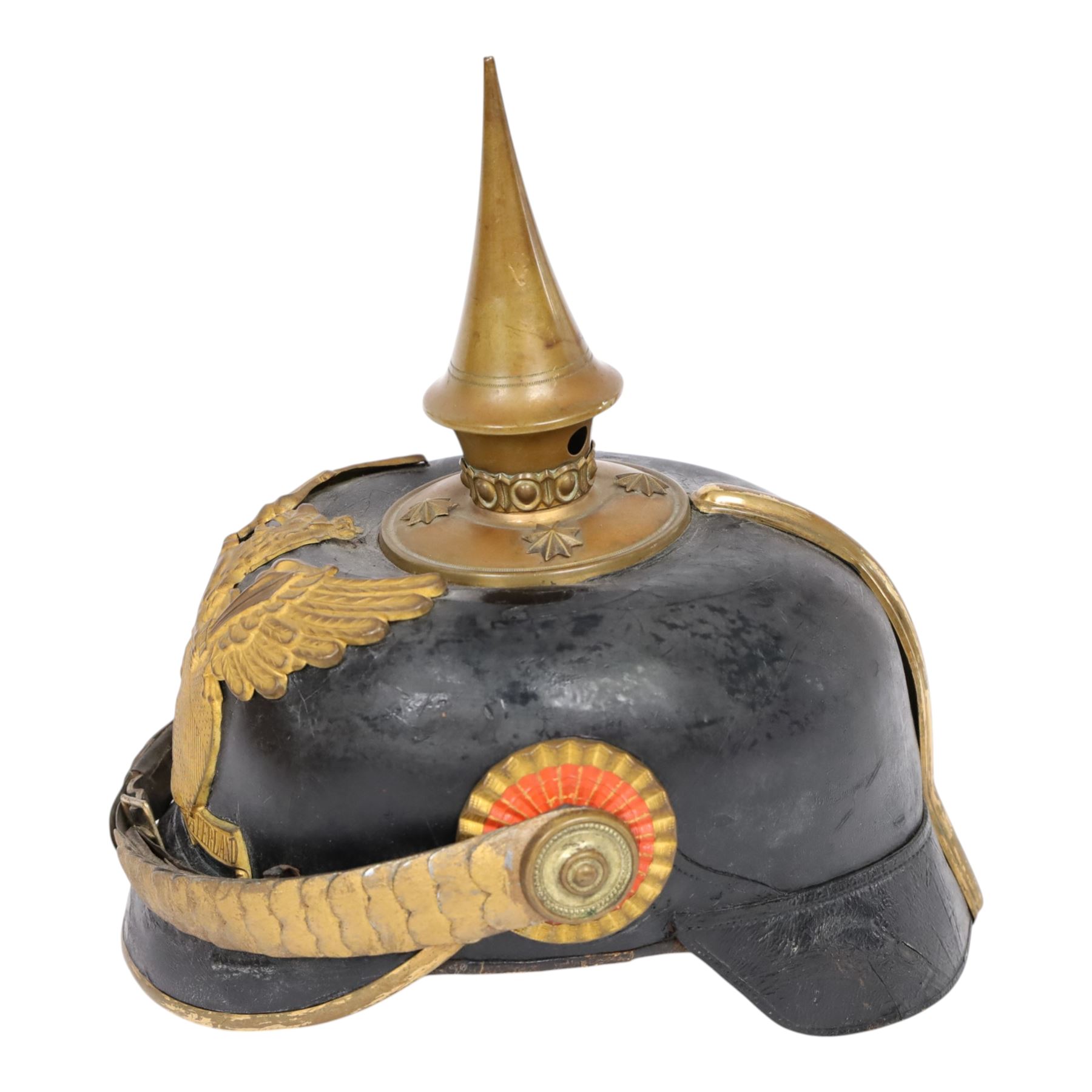 WWI Prussian Pickelhaube, Baden Infantry Regiment, the black leather skull with detachable brass spike, the circular base plate set with four star retaining studs, brass eagle helmet plate, both sides with red and black cockades