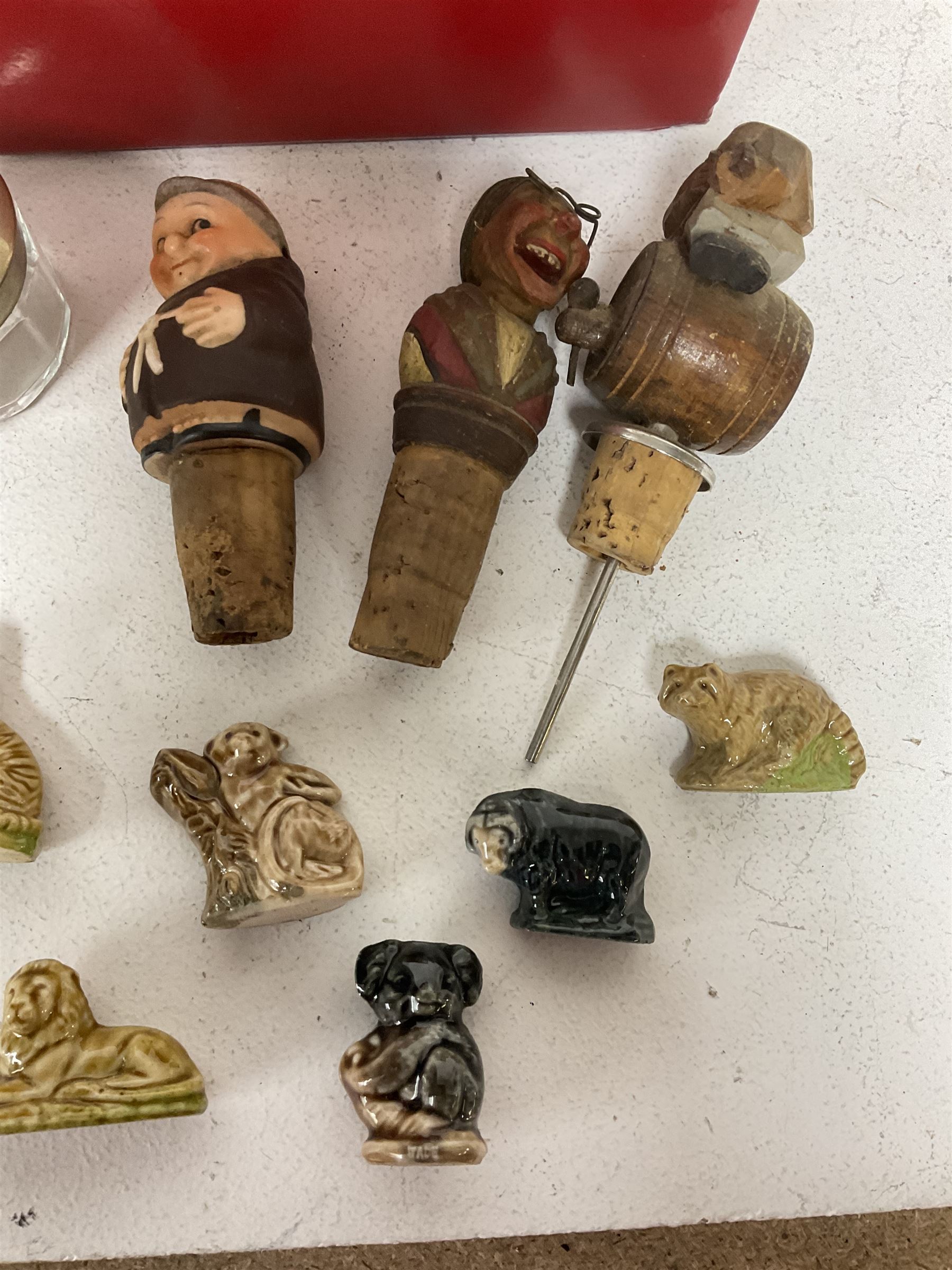 Seven Wade Whimsies, leather falcon hood, three novelty bottle corks, pair of EPNS open salts and other collectables