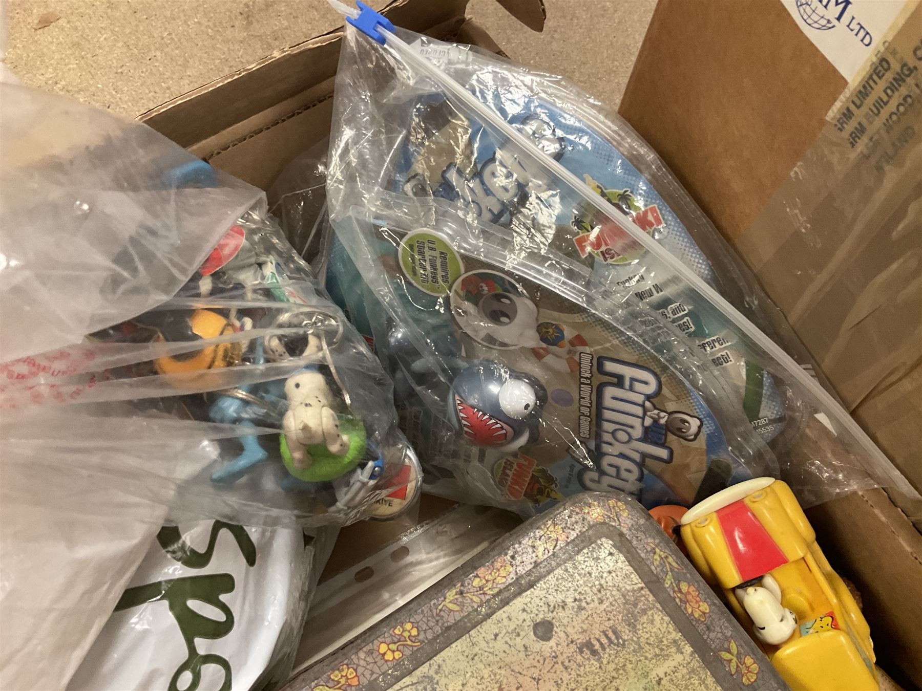 Large quantity of modern toys to include Matchbox Chopper Chase, Nikko battery control airplane, small amounts of K’nex, Meccano, playing cards to include Yu-Gi-Oh cards, keyrings etc in three boxes 