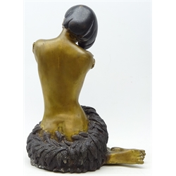  Cast metal figure of a seated semi nude woman, H38cm   