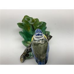 Minton majolica leaf dish, modelled as a Blue Tit perched on a branch with acorns and an oak leaf, date cypher for 1868, impressed marks beneath, L21cm. 