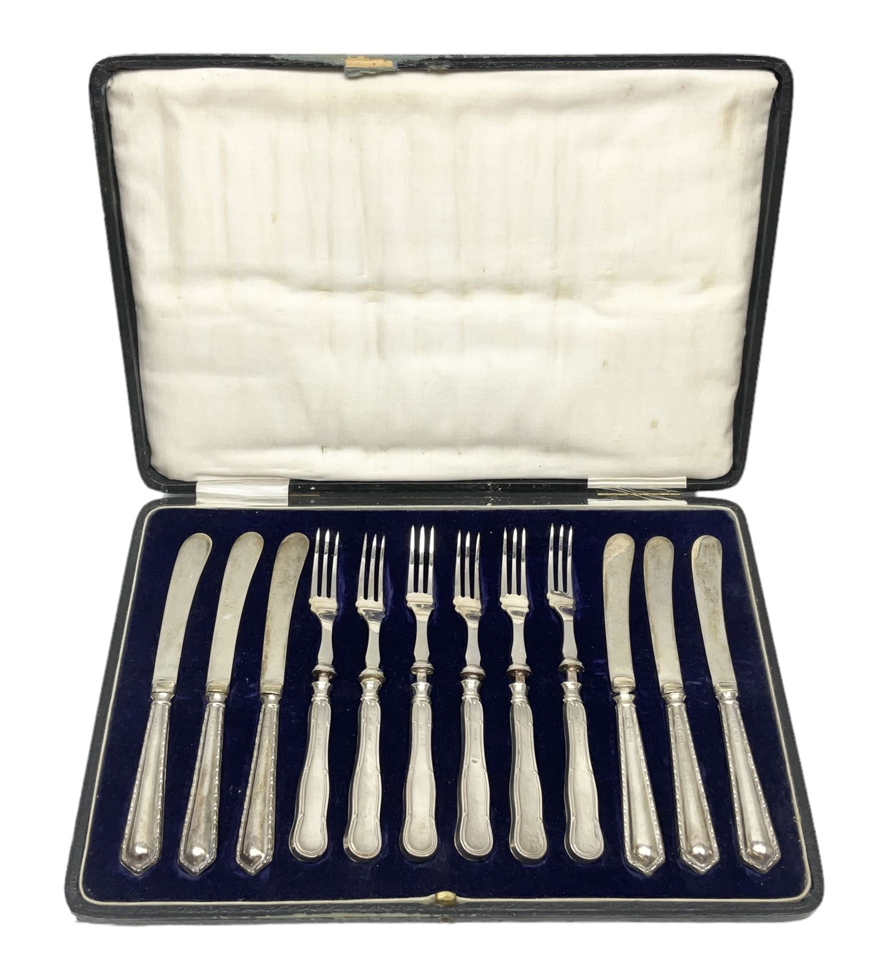 Cased set of six silver handled dessert knives and forks, hallmarked 