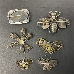 9ct gold jewellery including leaf brooch, wishbone Mizpah brooch, carnelian brooch, gold cased ladies Omega wristwatch, on leather strap and gold cased ladies Tissot wristwatch on expanding gilt strap, together with silver brooches and a Czech paste buckle, etc