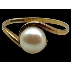 Four 9ct gold stone set rings, including garnet and pearl examples, all stamped or hallmarked