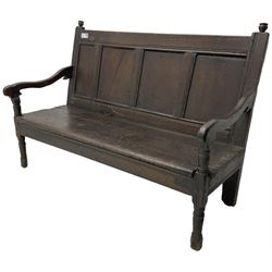 18th century oak hall bench or settle, quadruple panelled back with moulded rails, over a solid seat, raised on front turned supports