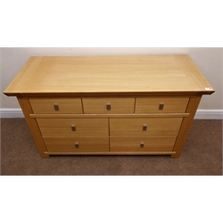  Ponsfords of Sheffield solid light oak chest, three short and four long drawers, stile supports, W128cm, H74cm, D50cm  