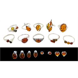 Ten silver Baltic amber rings and four pairs of Balitc amber stud earrings (14)