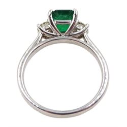 18ct white gold emerald and diamond three stone ring, hallmarked, emerald 1.16 carat, total diamond weight 0.39 carat, with World Gemological Institute Certificate 