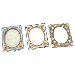Seven micro mosaic pictures frames, each decorated with flowers, largest H11cm