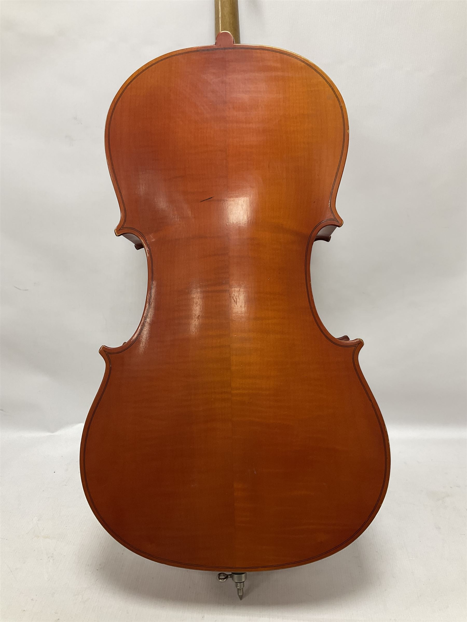 3/4 size cello with soft case, 69cm back length, 114cm full length, with bridge, ebonised tail piece and fingerboard.
