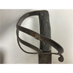 George V British Army 1897 pattern officers sword with plain 82cm fullered steel blade, pierced  basket hilt with George V cypher and wire bound leather grip with chequered backstrap; in leather covered field service scabbard L101cm overall; and another officer's sword in relic condition lacking scabbard (2)