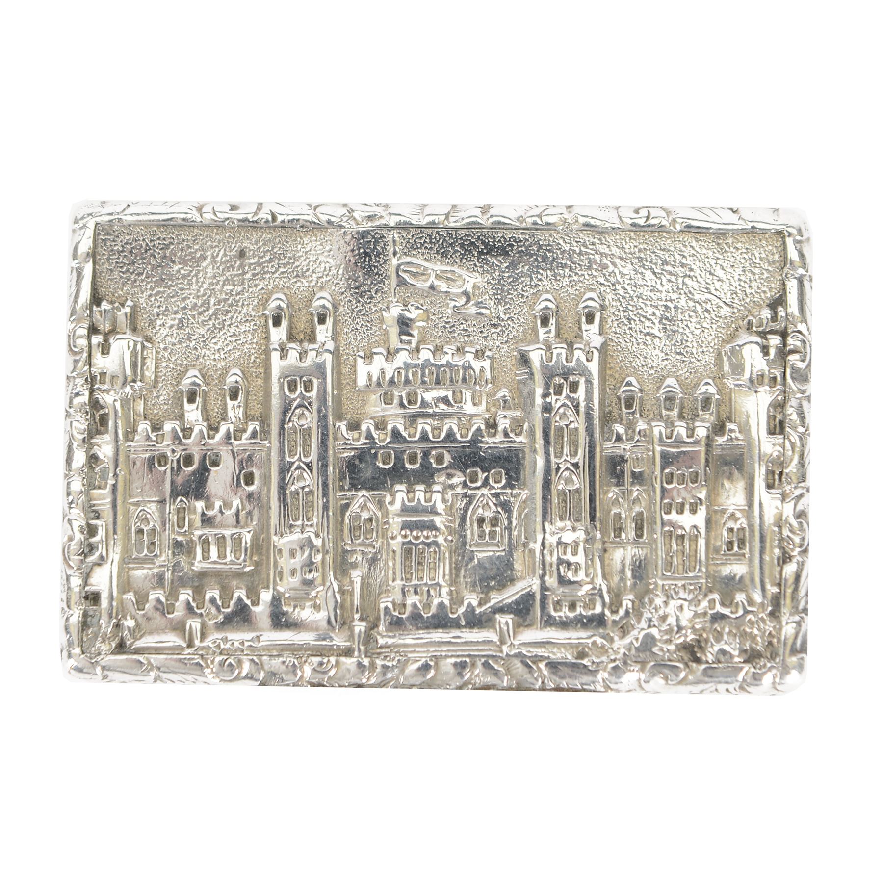 Victorian silver castle-top vinaigrette, of rectangular form, the hinged cover relief embossed with Windsor Castle, opening to reveal a foliate pierced grille, hallmarked Gervase Wheeler, Birmingham 1839, W4cm