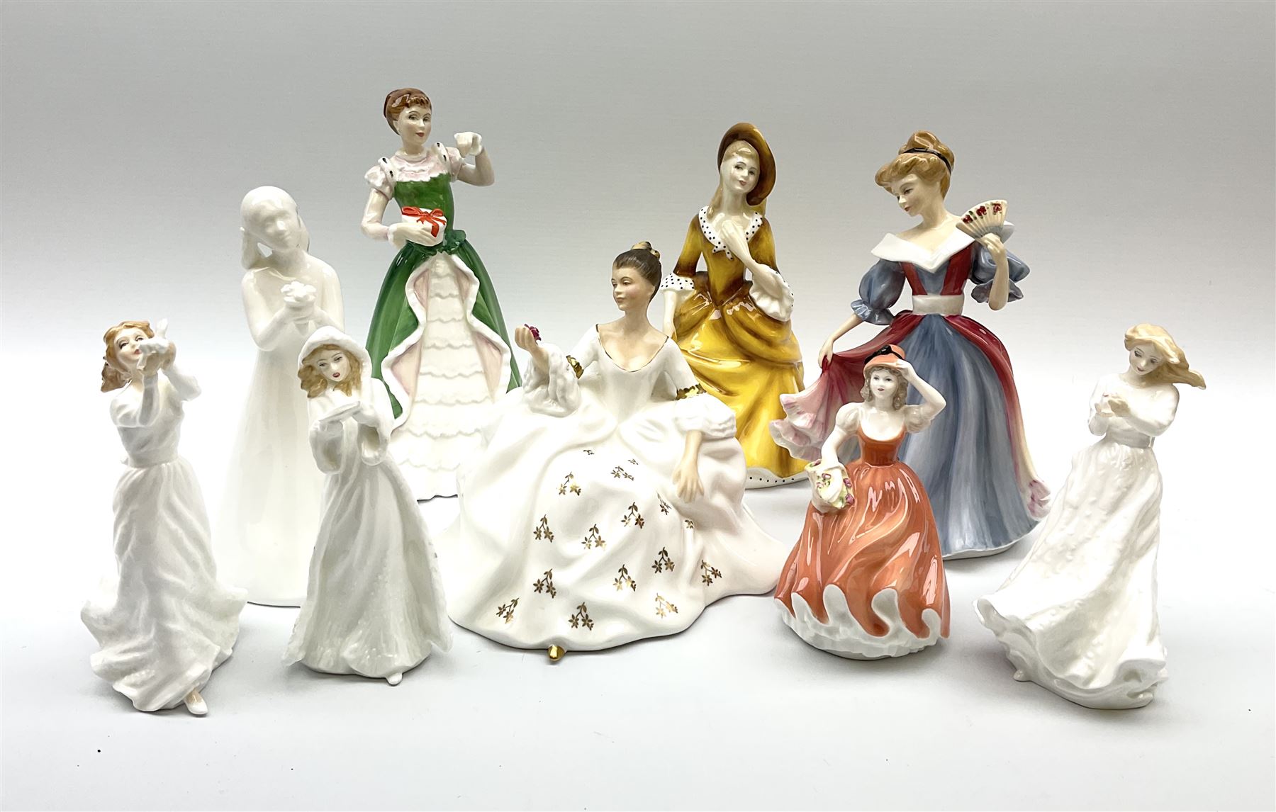 Nine figures; eight Royal Doulton, , Amy, Sandra, thank you, thinking of you, Christmas carols, my love, happy birthday, Merry Christmas and one Coalport figures, Andrea 