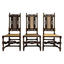 Set six 19th century oak Carolean style dining chairs, the cresting rail with open crown flanked by putto, spiral turned uprights with pineapple finials, canework seat and back, the seat rails carved with foliage, spiral turned supports joined by s-scroll and open crown carved front rail, decorated with flower heads, each with upholstered seat pad