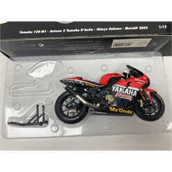 Four Minichamps 1:12 scale die-cast motorcycles - Honda RC211V Team Movistar Honda MotoGP Rider Marco Melandri MotoGP 2005; Yamaha YZR-M1 Antena 3 Yamaha D'Antin Shinya Nakano MotoGP 2003; Yamaha YZR-M1 Max Biaggi MotoGP 2002; and Ducatti 999FO4 Gregorio Lavilla BSB 2005; all boxed (4)